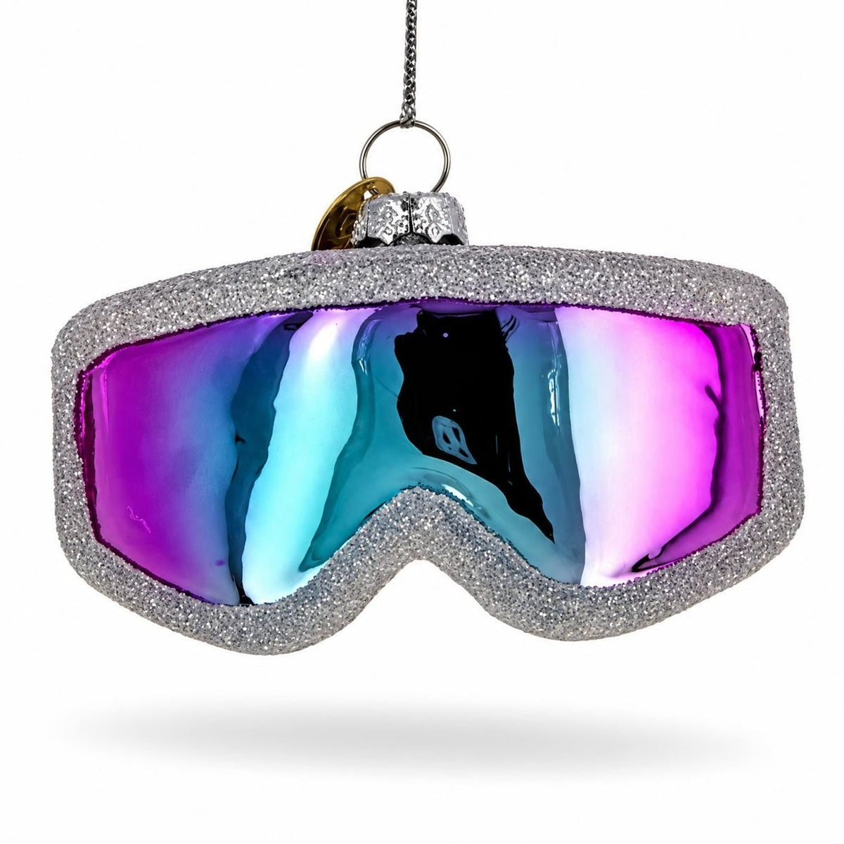 Ski goggle ornament with an iridescent purple and blue lens and a silver frame.