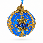 Gold Glitter Scrolls and Blue Gem Snowflake on Royal Blue Glass Ball Christmas Ornament